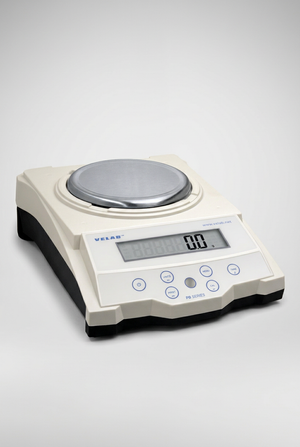 Balanza electrónica VE-500 completa, con plato circular, sobre fondo gris claro en formato vertical.